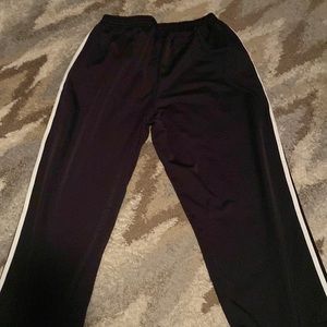 Men’s classic 3 stripe Adidas track pants. Black with white stripe.